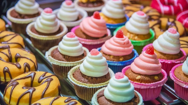 A plate full of sugary snacks which are bad for children's dental health