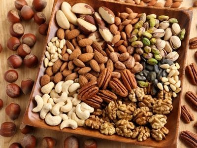 Nuts shown as one of the best foods for dental health Tray of mixed nuts